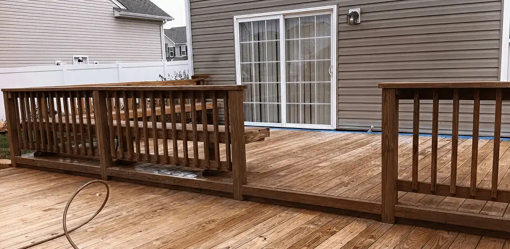 Deck sealing service protecting a backyard wood deck and railings in Columbus, OH