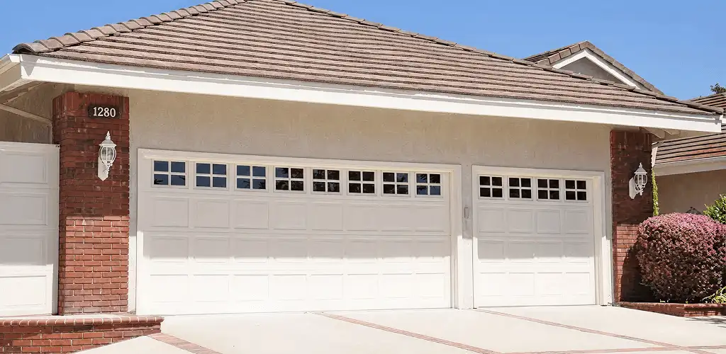 Residential garage door repair service for a double garage door in Columbus, OH