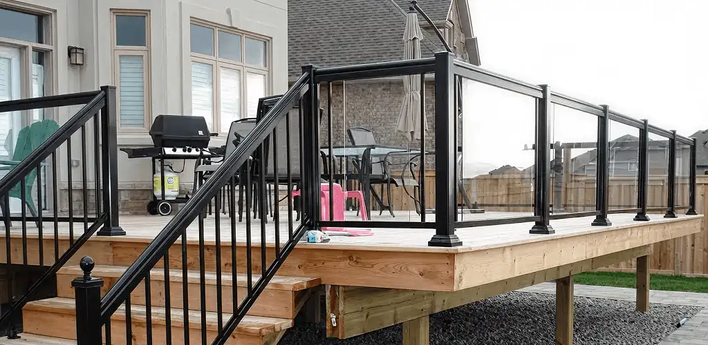Handrail installation on a deck staircase for safety and code compliance in Columbus, OH