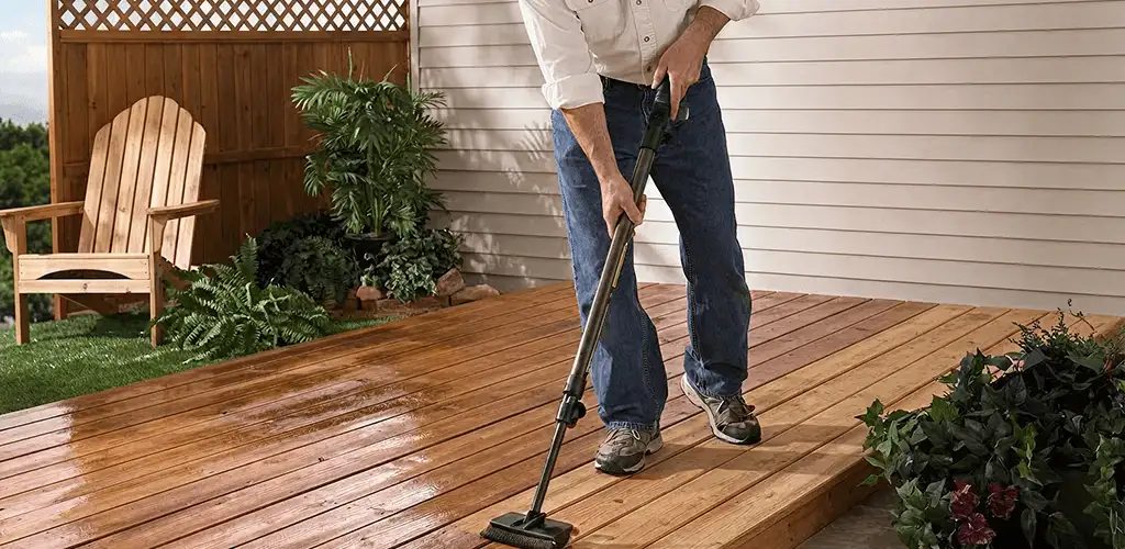 Deck staining service applying stain to a backyard wood deck in Columbus, OH